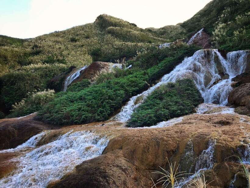 From Taipei: Old Gold Rush Town Jiufen Guided Night Tour - Golden Waterfall: the ore-driven reason it looks bronze