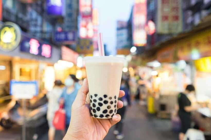 Private Taipei City Layover Tour from TPE Airport - Dihua Street photo stop: street energy, Xiao Long Bao, and bubble tea